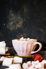 Good New Year spirit. Coffee with marshmallows and cinnamon. Pink mug. Cooking yourself. Photos for coffee. Home comfort. New Year. Christmas time. Winter mood.