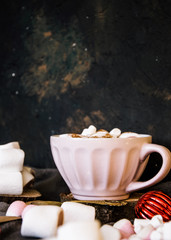 Good New Year spirit. Coffee with marshmallows and cinnamon. Pink mug. Cooking yourself. Photos for coffee. Home comfort. New Year. Christmas time. Winter mood.
