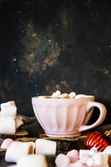 Good New Year spirit. Coffee with marshmallows and cinnamon. Pink mug. Cooking yourself. Photos for coffee. Home comfort. New Year. Christmas time. Winter mood.