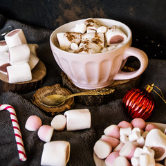 Good New Year spirit. Coffee with marshmallows and cinnamon. Pink mug. Cooking yourself. Photos for coffee. Home comfort. New Year. Christmas time. Winter mood.