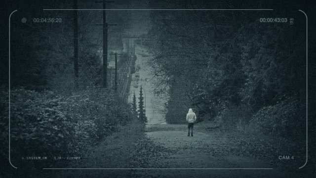 CCTV Man Walking Down Hill