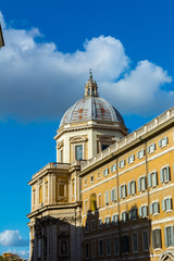 The Basilica of Santa Maria Maggiore on Blue Partially Cloudy Sky  Background.