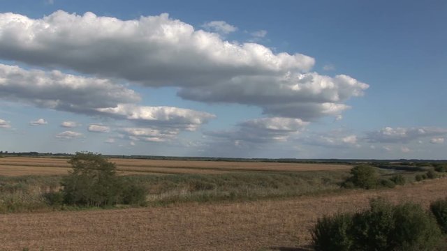 2 in 1 blue sky with clouds above the plain in autumn