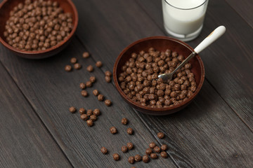 Whole grain Breakfast. Chocolate balls with milk