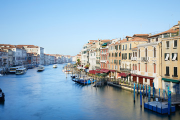 Fototapeta na wymiar Grand Canal in Venice in a sunny morning, clear blue sky in summer in Italy