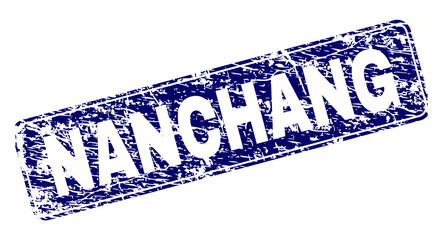 NANCHANG stamp seal print with grunge texture. Seal shape is a rounded rectangle with frame. Blue vector rubber print of NANCHANG tag with grunge texture.