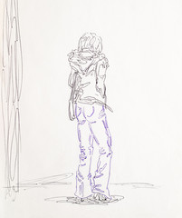 Figure ballpoint pen, a woman in heels in jeans and a jacket stands with his back to us