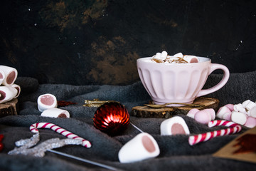 Good New Year spirit. Coffee with marshmallows and cinnamon. Pink mug. Cooking yourself. Photos for coffee. Home comfort. New Year. Christmas time. Winter mood.