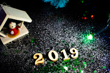 Happy New Year 2019 on black crystal background.