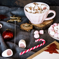 Good New Year spirit. Coffee with marshmallows and cinnamon. Pink mug. Cooking yourself.Home comfort. New Year. Christmas time. Winter mood.Letter to Santa Claus. To Do list.New Year resolution
