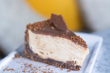 Caramel cheesecake with caramel sauce and nuts