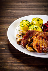 Grilled pork chop with vegetables