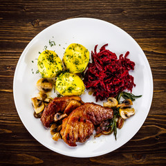 Grilled pork chop with vegetables