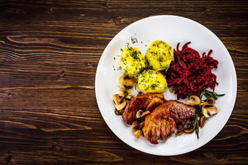 Grilled pork chop with vegetables