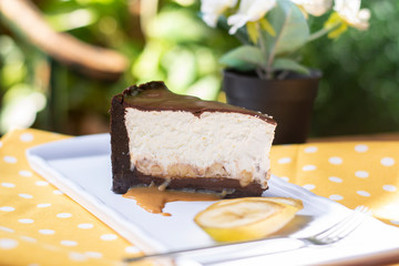 Banana split cake with caramel sauce and banana pieces