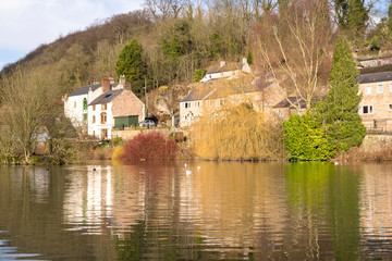 Fototapeta na wymiar Village millpond in Cromford, Derbyshire, UK