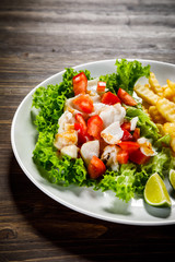 Fried cod and vegetables with french fries