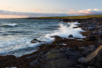 Stony coast at sunset in Iceland