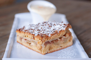 Apple pie with custard sauce