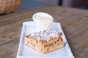 Apple pie with custard sauce