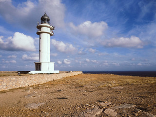 Barbaria Lighthouse at the top of a cliff