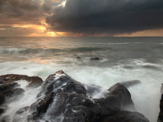 Stony coast at sunset in Iceland