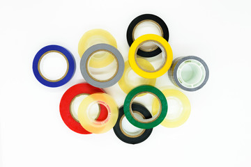 Various colors round adhesive tapes on white background surface