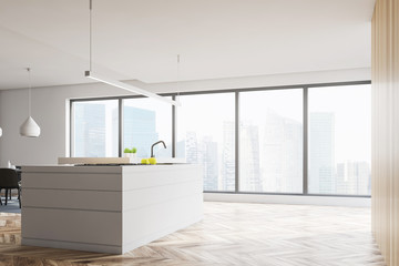 White kitchen interior with island