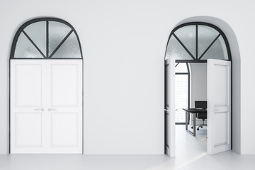 White office corridor with open door