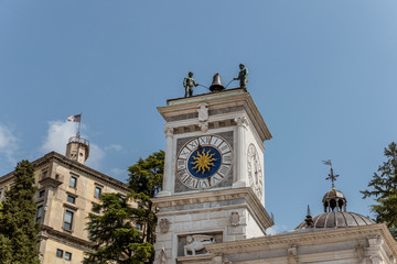 Fototapeta na wymiar The Clock Tower of San Giovanni Church in central Freedom Square.