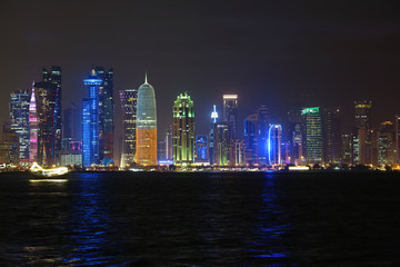 Fototapeta na wymiar Financial centre in Doha city at night, Qatar