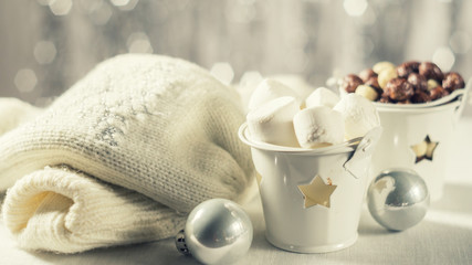 Buckets with marshmallows and corn balls in the New Year Christm