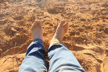 Fototapeta premium feet in sand