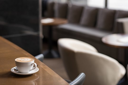 Coffee cup on table in hotel