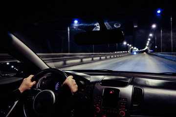 driving a car at night on the way
