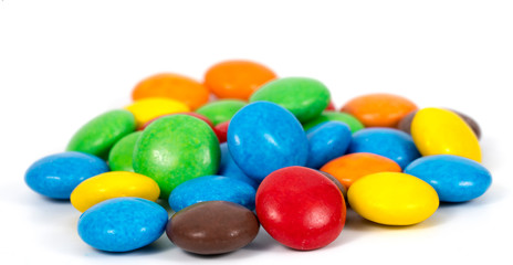 Colorful candies on white background