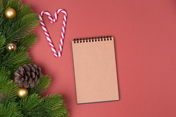 Blank notebook list and fir tree, Top view with copy space. New year concept. Christmas concept. Winter concept.