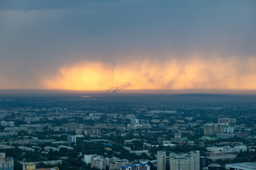 Fototapeta premium Almaty Skyline during a Sunset Rain, Kazakhstan in August 2018taken in hdr taken in hdr