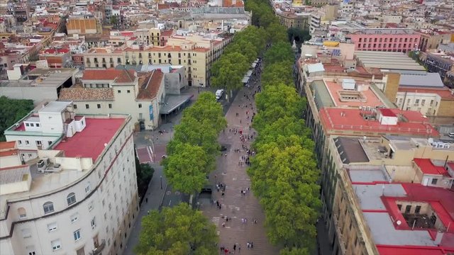 Aerial view of people are walking at famous street La Rambla in Barcelona