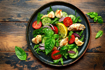 Vegetable salad with fried chicken.Top view with copy space.