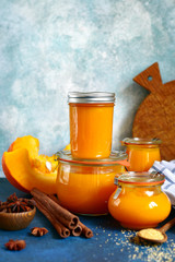 Pumpkin puree with spices in a vintage jars.