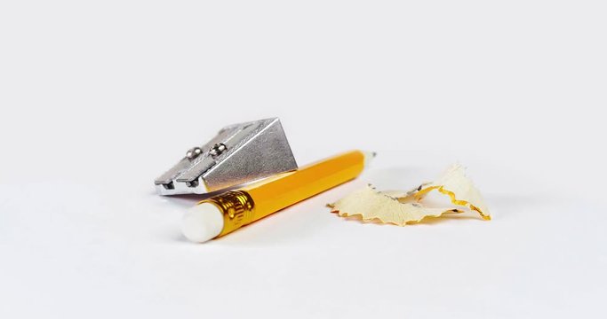 Close-up of erase pencil, sharpener and cuttings
