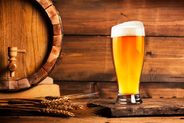Wooden barrel and beer