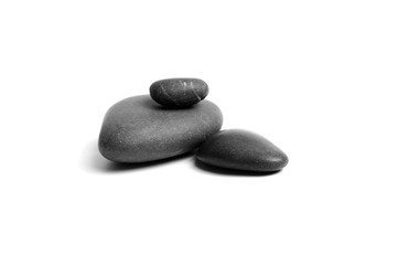 Fototapeta na wymiar Sea pebble. Group of smooth grey and black stones. Pebbles isolated on white background