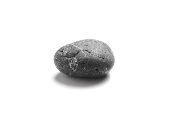 Pebble. Smooth black sea stone with cracks on the surface. Isolated on white background