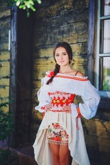 Beautiful young Russian girl in national costume