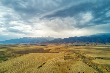 Fototapeta na wymiar Thunderstorm View Towards Kyrgyzstan in Southern Kazakhstan taken in August 2018taken in hdr taken in hdr