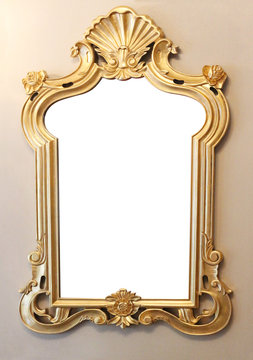 Gold decorative picture frame on wall background