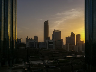 Fototapeta na wymiar Abu Dhabi city beautiful clouds and Towers at sunset