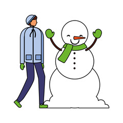 man with winter clothes and snowman